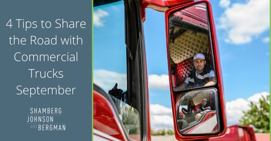 truck driver in side view mirror